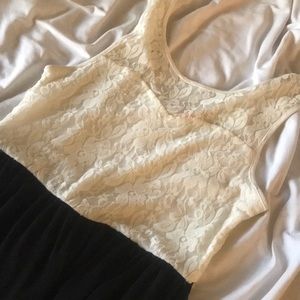 Thigh length white and black dress